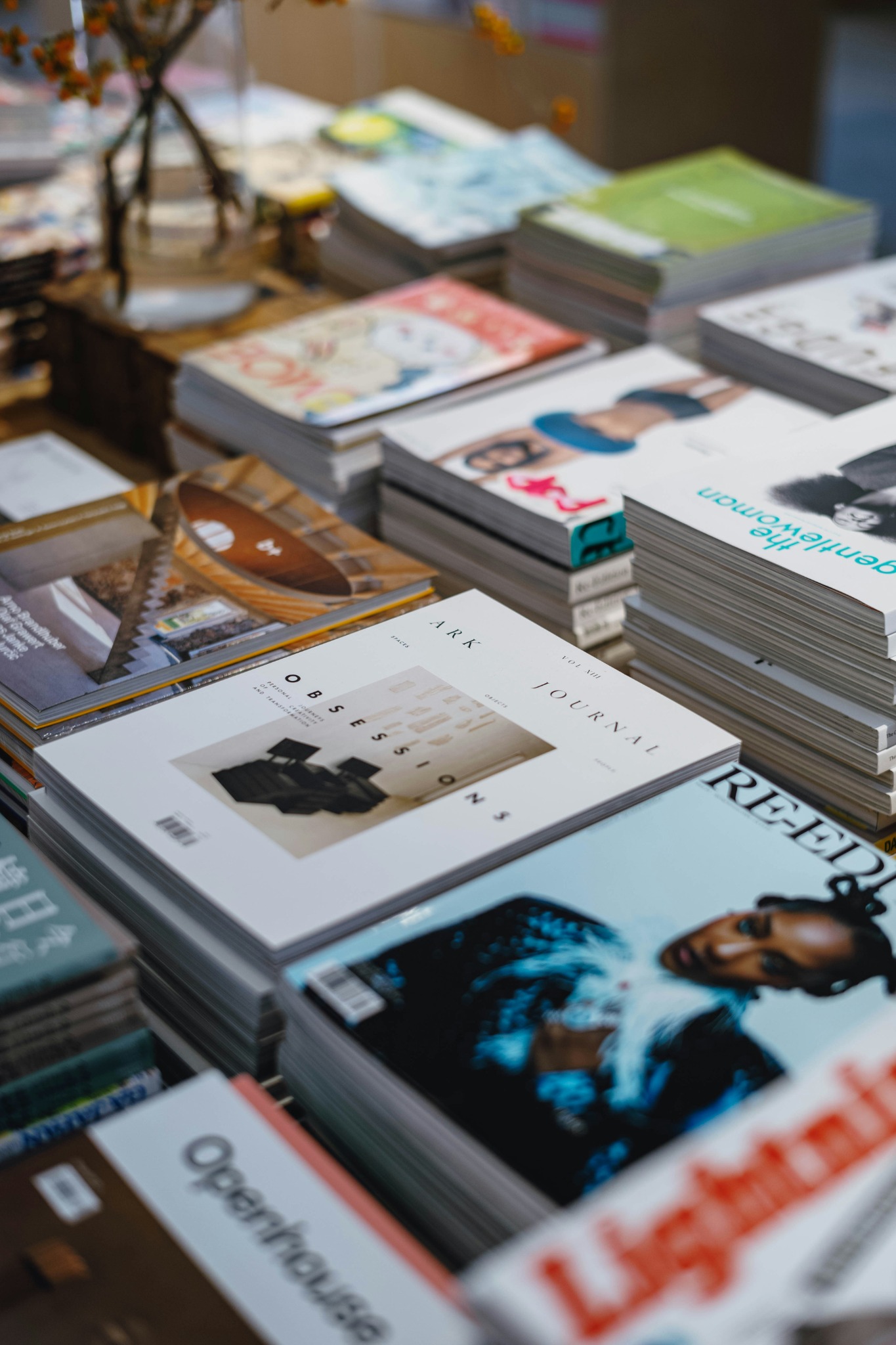 Editorial stacks of magazines and journals
